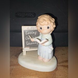 Precious Moments Teacher. “ Teach us to love one another”.